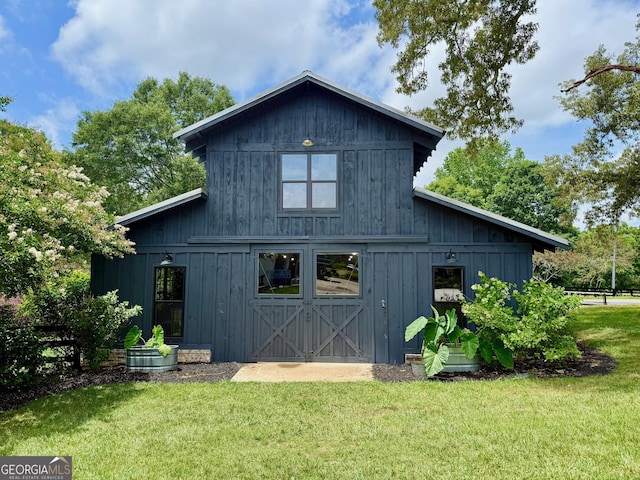 7093 Vaughn Rd, Canton, GA 30115 - view of barn with a yard