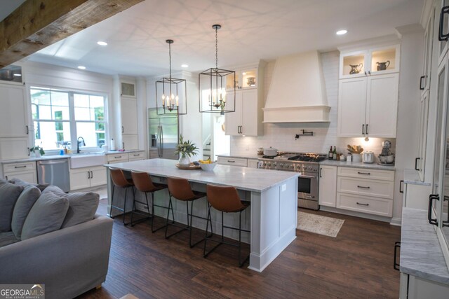 7093 Vaughn Rd, Canton, GA 30115 - kitchen with appliances with stainless steel finishes, custom exhaust hood, open floor plan, dark wood-style flooring, and recessed lighting