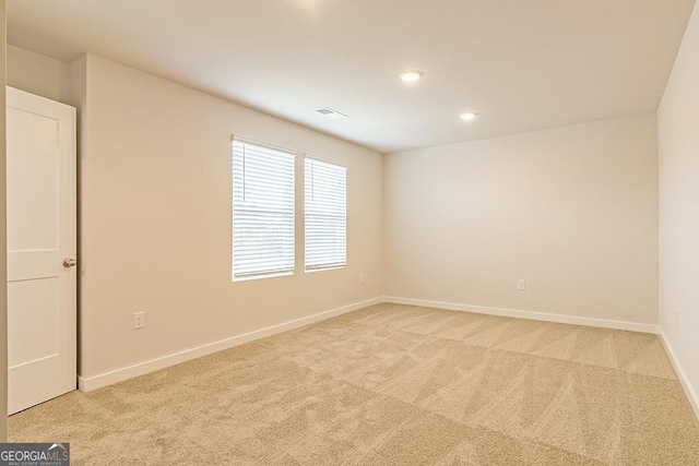 131 Post Oak Dr Way Unit 207, Jackson, GA 30233 - spare room with light colored carpet and recessed lighting