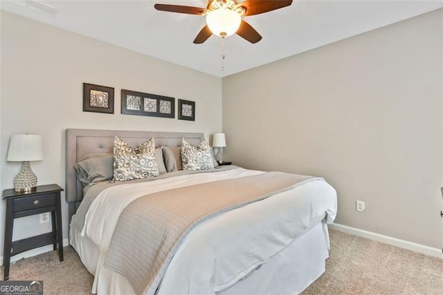121 Fairway Overlook, Woodstock, GA 30188 - carpeted bedroom with baseboards and ceiling fan