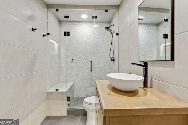 121 Fairway Overlook, Woodstock, GA 30188 - full bath with tile walls, a stall shower, vanity, and tile patterned flooring