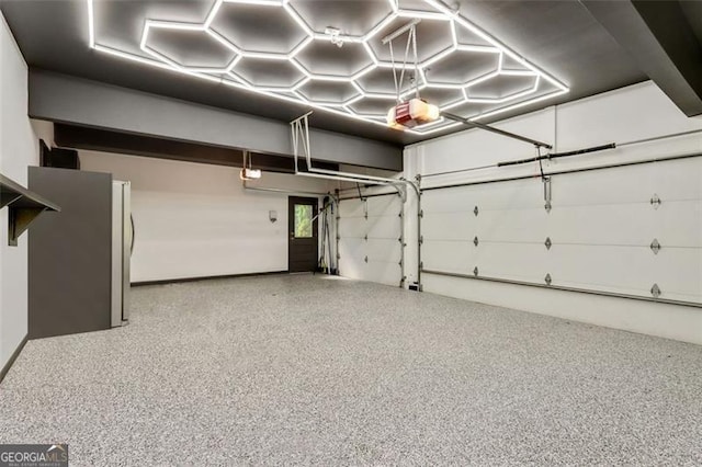 121 Fairway Overlook, Woodstock, GA 30188 - garage featuring a garage door opener and freestanding refrigerator