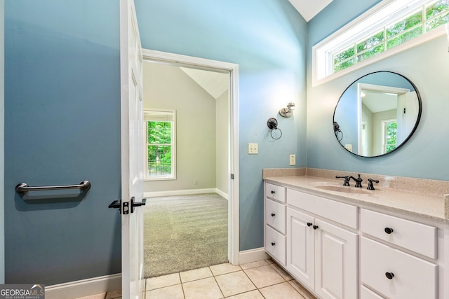 115 Edgewater Way, Peachtree City, GA 30269 - bathroom featuring vanity, tile patterned floors, and lofted ceiling