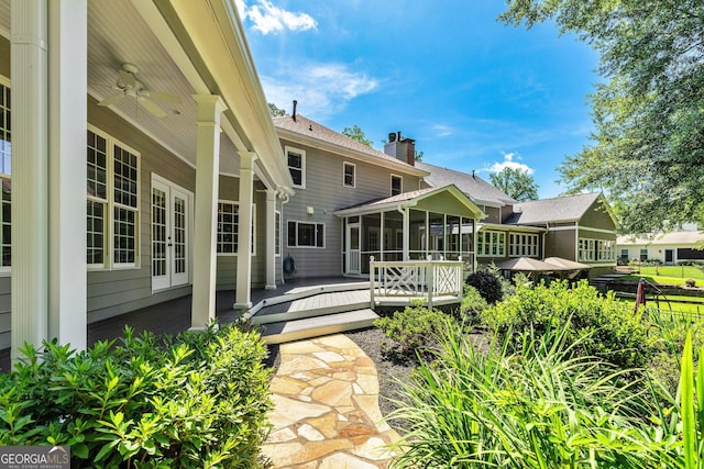 115 Edgewater Way, Peachtree City, GA 30269 - back of house with a sunroom, a chimney, a deck, and a ceiling fan