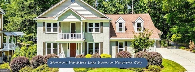 115 Edgewater Way, Peachtree City, GA 30269 - view of front of home with driveway and a balcony
