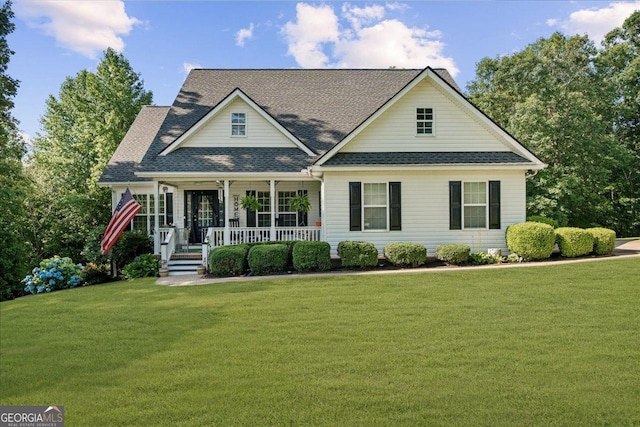 221 Timber Ridge Dr, Clarkesville, GA 30523 - traditional-style home featuring a porch, a front lawn, and roof with shingles