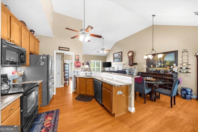 221 Timber Ridge Dr, Clarkesville, GA 30523 - kitchen with black appliances, light wood-type flooring, brown cabinetry, open floor plan, and ceiling fan