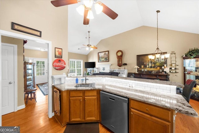 221 Timber Ridge Dr, Clarkesville, GA 30523 - kitchen featuring stainless steel dishwasher, open floor plan, ceiling fan, light wood-style floors, and lofted ceiling