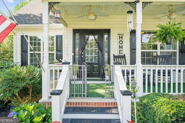221 Timber Ridge Dr, Clarkesville, GA 30523 - doorway to property featuring roof with shingles, ceiling fan, and covered porch