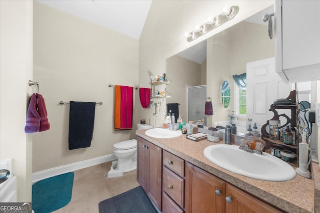 221 Timber Ridge Dr, Clarkesville, GA 30523 - bathroom with a shower stall, double vanity, and vaulted ceiling