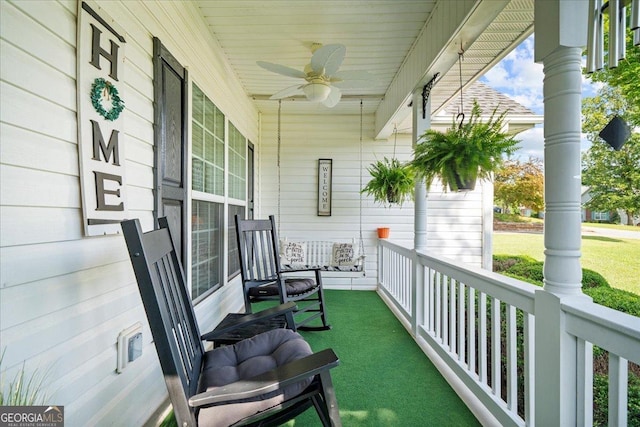 221 Timber Ridge Dr, Clarkesville, GA 30523 - covered porch featuring ceiling fan