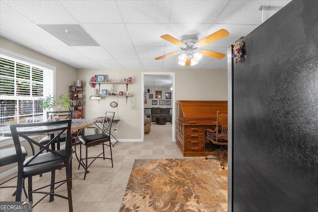 221 Timber Ridge Dr, Clarkesville, GA 30523 - dining area featuring a drop ceiling, a ceiling fan, and tile patterned floors