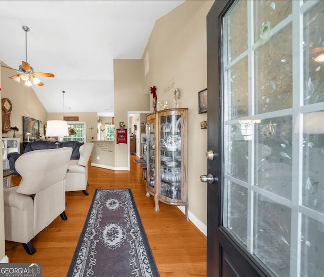 221 Timber Ridge Dr, Clarkesville, GA 30523 - living area featuring ceiling fan, vaulted ceiling, and wood finished floors
