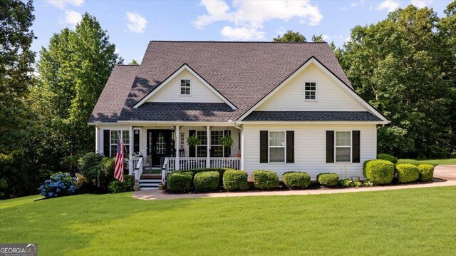 221 Timber Ridge Dr, Clarkesville, GA 30523 - view of front of home featuring a front yard, covered porch, and a shingled roof