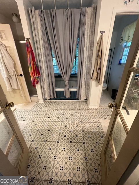 974 Bloomfield Dr, Lawrenceville, GA 30044 - bathroom featuring toilet and tile patterned floors