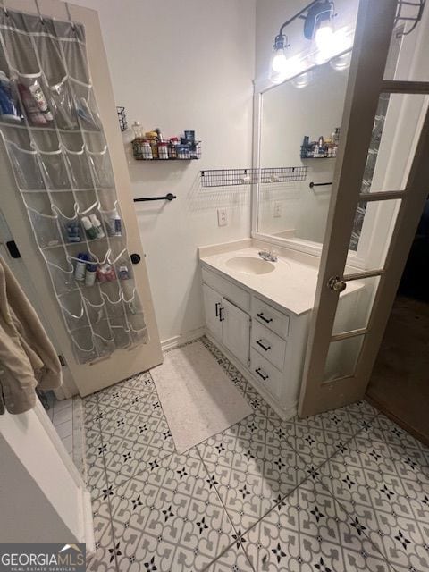 974 Bloomfield Dr, Lawrenceville, GA 30044 - bathroom featuring vanity and tile patterned floors