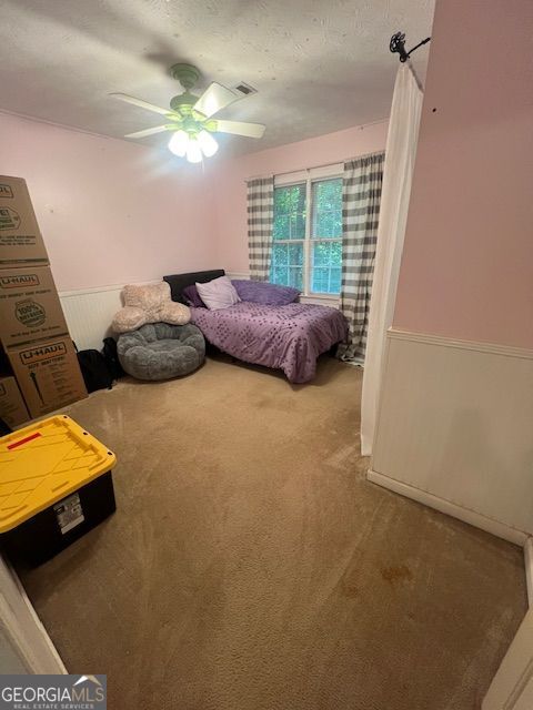 974 Bloomfield Dr, Lawrenceville, GA 30044 - bedroom with carpet floors and ceiling fan