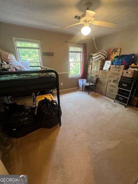 974 Bloomfield Dr, Lawrenceville, GA 30044 - bedroom with light carpet and ceiling fan