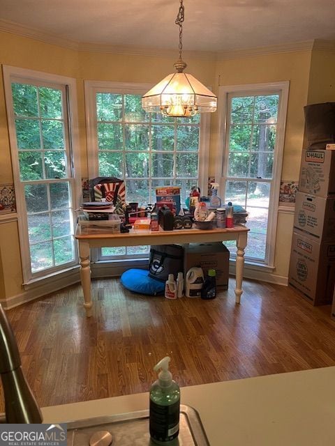 974 Bloomfield Dr, Lawrenceville, GA 30044 - dining room featuring crown molding, a chandelier, and wood finished floors