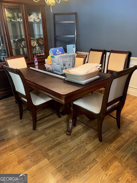 974 Bloomfield Dr, Lawrenceville, GA 30044 - dining area featuring a chandelier and light wood finished floors