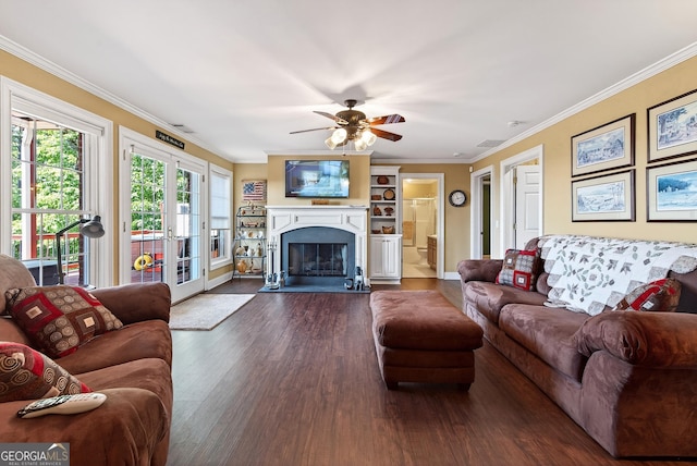 865 Laurel Ridge Rd, Cleveland, GA 30528 - living area with dark wood-style floors, ceiling fan, crown molding, and a glass covered fireplace