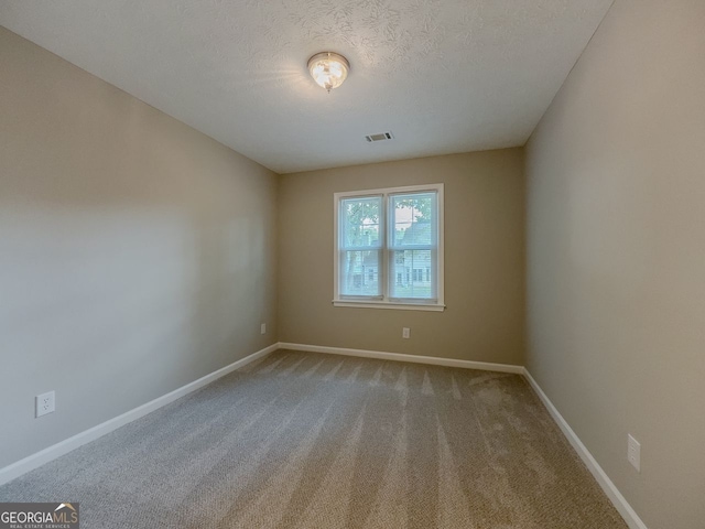 1904 Watercrest Cir, Lawrenceville, GA 30043 - carpeted empty room featuring baseboards and a textured ceiling
