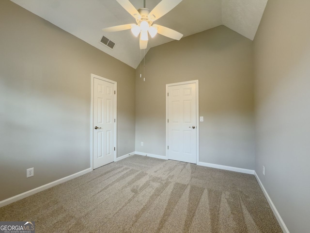 1904 Watercrest Cir, Lawrenceville, GA 30043 - spare room featuring ceiling fan, carpet flooring, and high vaulted ceiling