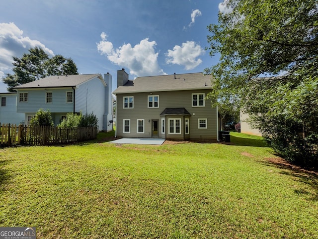 1904 Watercrest Cir, Lawrenceville, GA 30043 - rear view of house featuring a patio area and a chimney