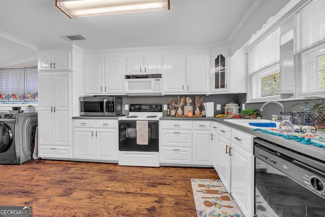 116 Rickman St, Toccoa, GA 30577 - kitchen featuring independent washer and dryer, white appliances, white cabinets, and ornamental molding