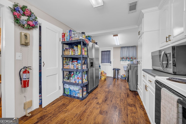 116 Rickman St, Toccoa, GA 30577 - kitchen featuring appliances with stainless steel finishes, dark wood-style floors, and white cabinets