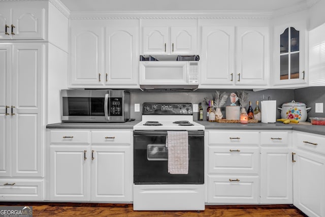 116 Rickman St, Toccoa, GA 30577 - kitchen featuring stainless steel microwave, white microwave, electric range, and white cabinets