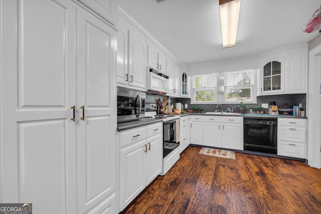 116 Rickman St, Toccoa, GA 30577 - kitchen with white appliances, glass insert cabinets, dark wood finished floors, and white cabinetry