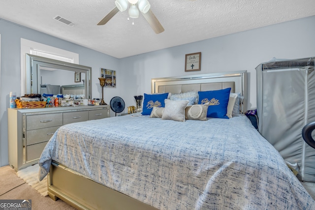 116 Rickman St, Toccoa, GA 30577 - bedroom with light carpet, a textured ceiling, and a ceiling fan