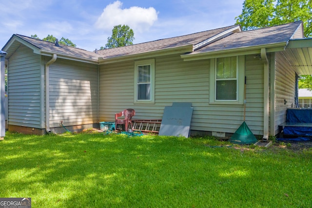 116 Rickman St, Toccoa, GA 30577 - back of house featuring a yard, crawl space, and a shingled roof