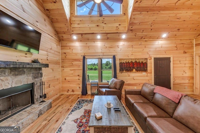 2092 Pleasant Hill Rd NE, Ranger, GA 30734 - living area featuring wooden ceiling, wooden walls, hardwood / wood-style flooring, ceiling fan, and a fireplace