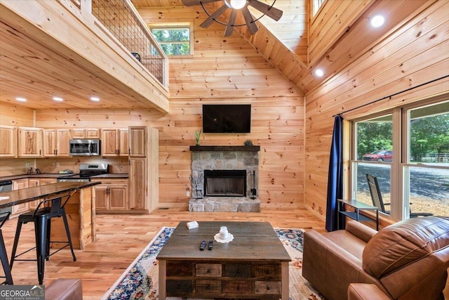2092 Pleasant Hill Rd NE, Ranger, GA 30734 - living room with a ceiling fan, light wood finished floors, a towering ceiling, recessed lighting, and plenty of natural light