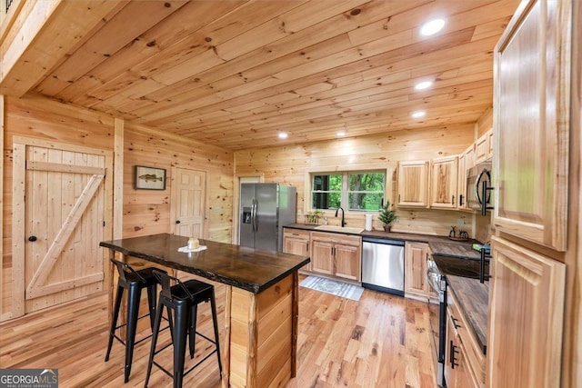 2092 Pleasant Hill Rd NE, Ranger, GA 30734 - kitchen with appliances with stainless steel finishes, wooden ceiling, dark countertops, a kitchen breakfast bar, and recessed lighting