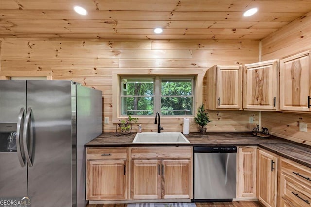 2092 Pleasant Hill Rd NE, Ranger, GA 30734 - kitchen featuring stainless steel appliances, dark countertops, light brown cabinetry, wood walls, and recessed lighting