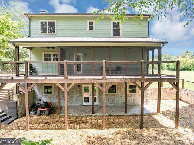 2092 Pleasant Hill Rd NE, Ranger, GA 30734 - farmhouse with ceiling fan, a patio, a deck, french doors, and a metal roof