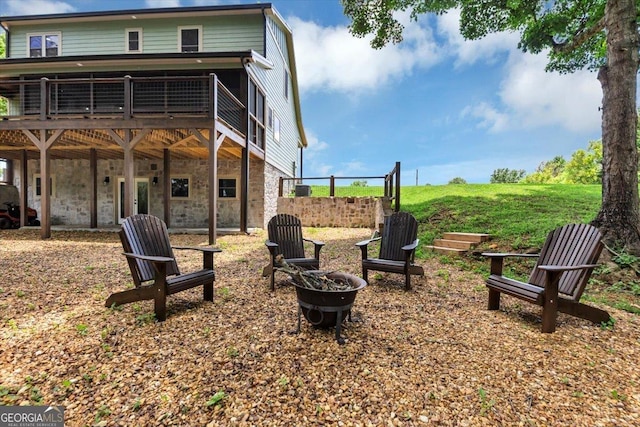 2092 Pleasant Hill Rd NE, Ranger, GA 30734 - view of yard featuring an outdoor fire pit and a deck