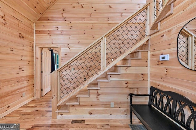 2092 Pleasant Hill Rd NE, Ranger, GA 30734 - stairs with wood walls, wood ceiling, lofted ceiling, and wood finished floors