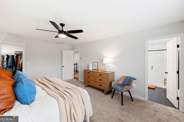1316 Willamette Way, Marietta, GA 30008 - bedroom featuring carpet, a walk in closet, a closet, ensuite bathroom, and a ceiling fan