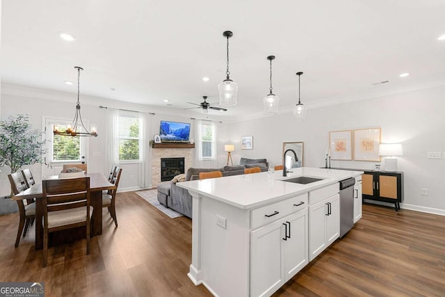 1316 Willamette Way, Marietta, GA 30008 - kitchen with dishwasher, a stone fireplace, ceiling fan, dark wood finished floors, and recessed lighting