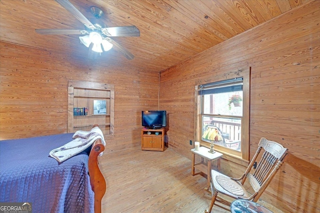 4253 Swallows Creek Rd, Hiawassee, GA 30546 - bedroom with wood ceiling, wood walls, wood finished floors, and ceiling fan
