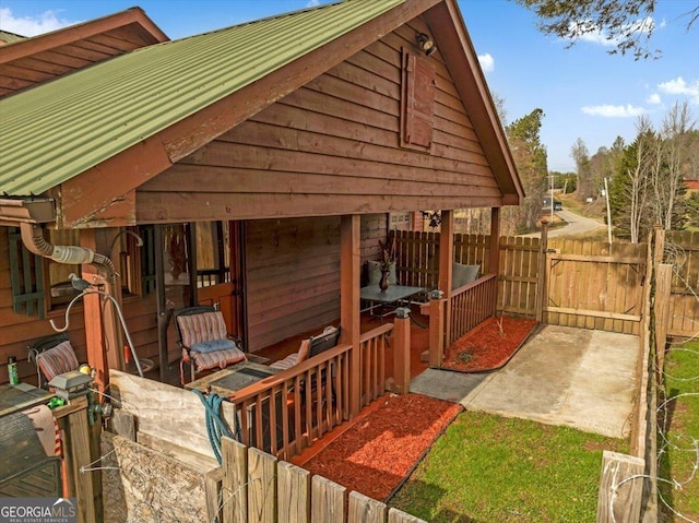 4253 Swallows Creek Rd, Hiawassee, GA 30546 - view of side of home with a gate