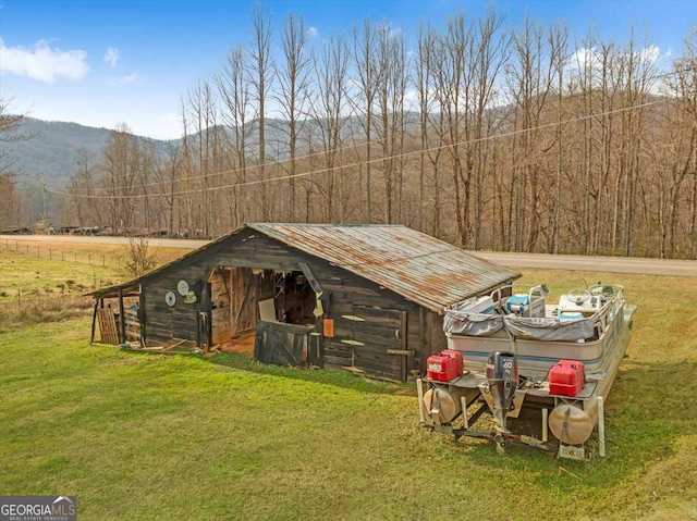 4253 Swallows Creek Rd, Hiawassee, GA 30546 - view of pole building with a yard, a view of trees, and a mountain view