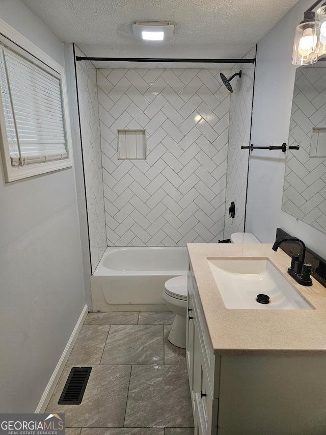 4422 Oates Ave, Columbus, GA 31904 - bathroom featuring vanity, shower / tub combination, and a textured ceiling