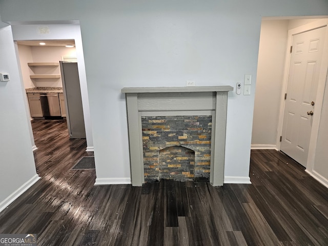 4422 Oates Ave, Columbus, GA 31904 - detailed view of a fireplace, wood finished floors, and stainless steel dishwasher