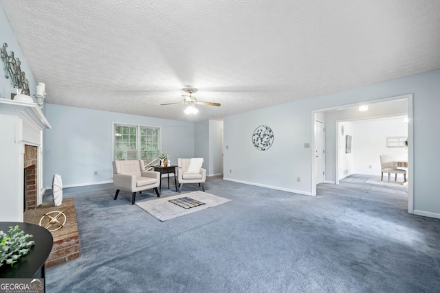 3 Maplelake Dr, Acworth, GA 30101 - living area with ceiling fan, a brick fireplace, a textured ceiling, and carpet