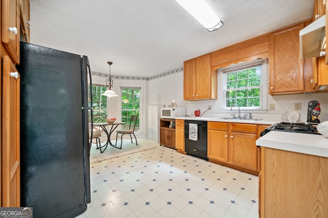 3 Maplelake Dr, Acworth, GA 30101 - kitchen featuring black appliances, light countertops, light flooring, decorative light fixtures, and extractor fan